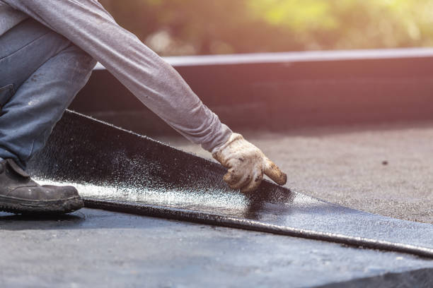 Professional Exterior Waterproofing technician working in Ottawa, KS